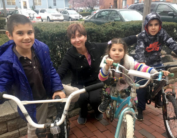 kids on bikes with mom