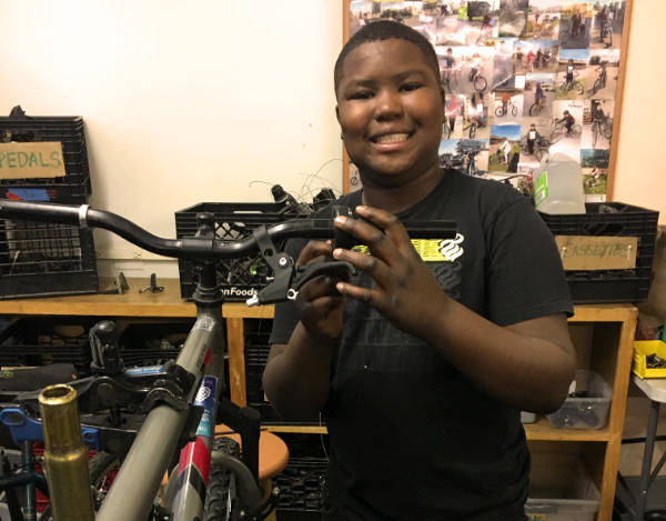 Kid Fixing Bike