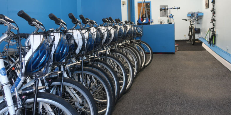 Bike Newport's fleet of identical rental bicycles at the Annex shop