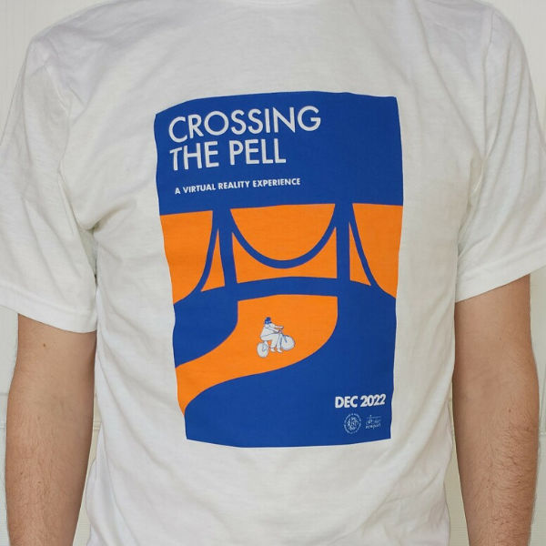 Closeup of white Tshirt with blue and orange bridge design and illustrated cyclist