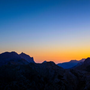 Dark mountain range at sunset