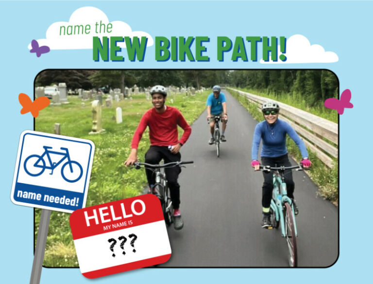 text: Name the New Bike path Three smiling riders on the new bike path