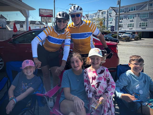 Cycling event with family and bicycles on a sunny day at Bike Newport Rhode Island.