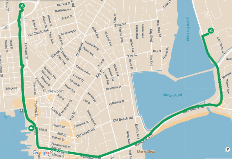 Bike Newport scenic cycling route along Easton Pond with views of Green End Pond in Newport Rhode Island.