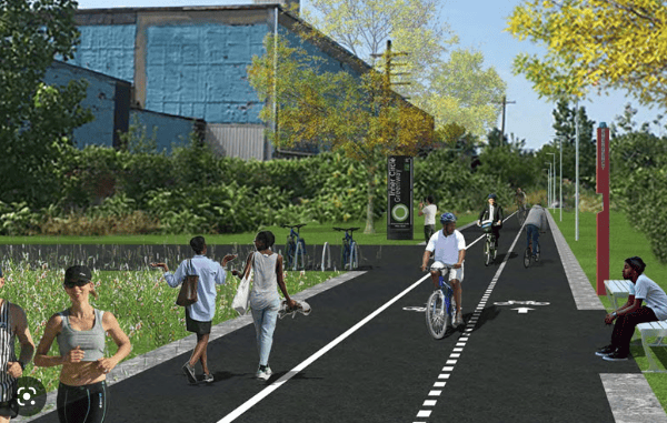Modern bike lane and pedestrian pathway in Newport, Rhode Island, promoting outdoor recreation and safe cycling routes.