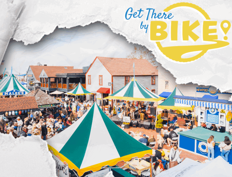 Vibrant outdoor marketplace in Newport with people enjoying festival atmosphere, colorful tents, and local vendors, promoting community and outdoor activities for biking enthusiasts.