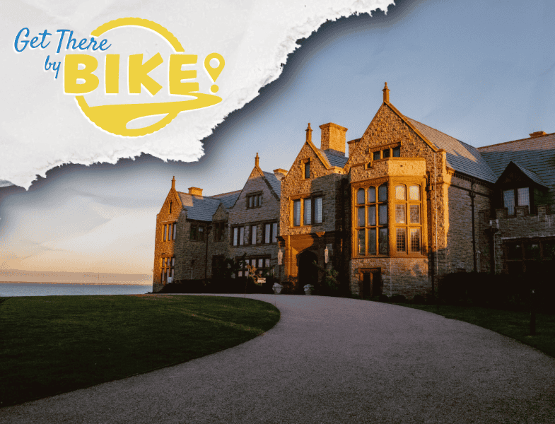 Historic Newport mansion with scenic coastal views, promoting biking and outdoor activities in Rhode Island.