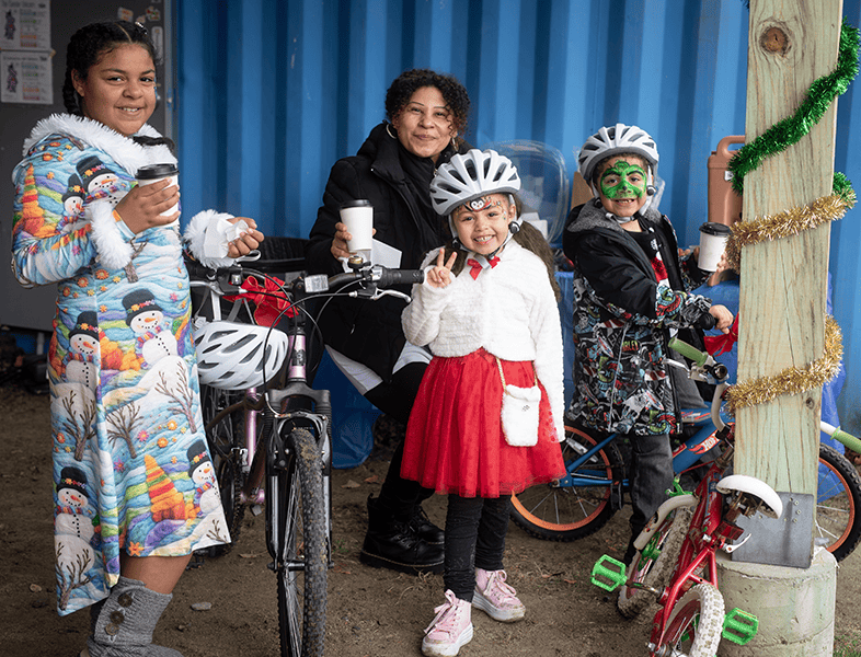 Children enjoying a bike ride and outdoor activities at Bike Newport event, promoting cycling, community events, family fun, and active transportation in Newport, Rhode Island.