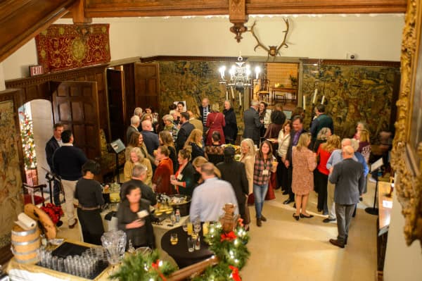 Indoor networking event at a historic venue for Bike Newport community engagement and cycling advocacy.