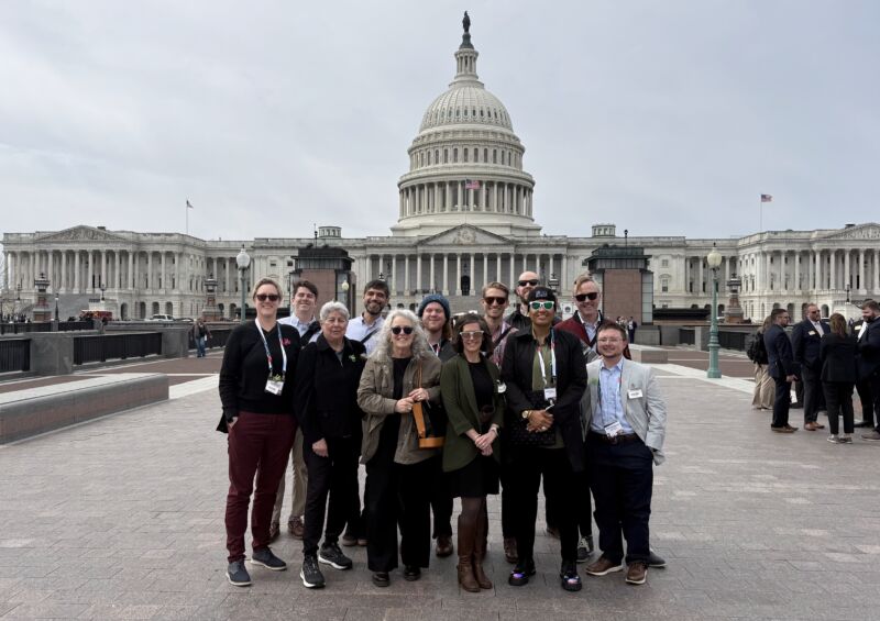 Group of diverse cyclists and advocates in front of the U.S. Capitol building during the National Bike Summit 2026, emphasizing diversity and inclusion in cycling advocacy.